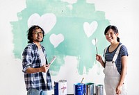Asian couple renovating the house
