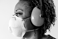 Black woman wearing ear protection