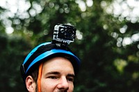 Man wearing safety helmet with video record camera