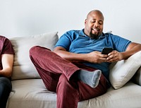 Black man using mobile phone