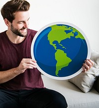 White man holding globe icon