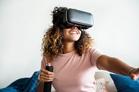Black woman experiencing virtual reality with VR headset