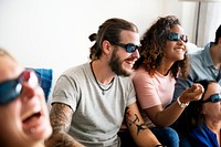 Group of diverse friends watching 3D movie together