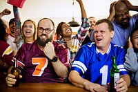 Friends cheering sport at bar together