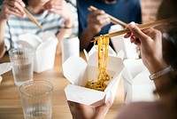 Friends eating Chow mein together