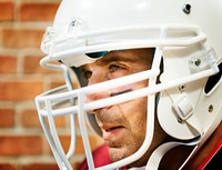 Man wearing Amerian football helmet