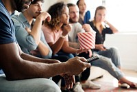 Friends cheering sport league together