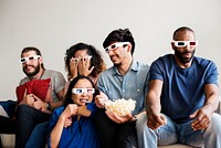 Group of diverse friends watching 3D movie together