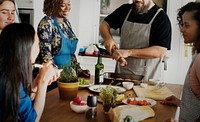 Diverse people joining cooking class