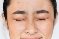 Closeup of Young Asian girl portrait eyes closed