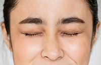 Closeup of Young Asian girl portrait eyes closed