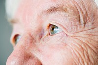 Closeup side portrait of white elderly woman&#39;s eyes