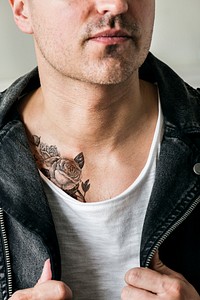 Close up of tattoo on the chest of a man