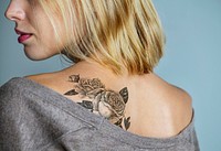 Tattooed back of a woman