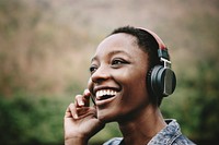 Woman listening to music in nature