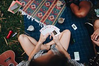 Group of friends playing a card game