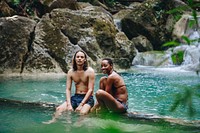 Couple enjoying the waterfall