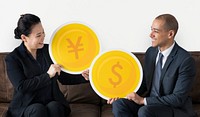 Business people with currency icons