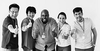 Workers standing and showing their thumbs up together