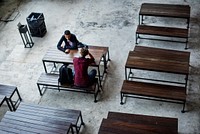 Teenage boys sitting together in a empty canteen