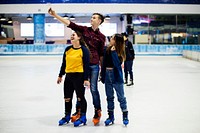 Teenage selfie together at ice skate