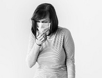 Sick woman wearing surgical mask