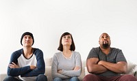 Group of diverse friends sitting on couch