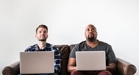 Two man working on laptop