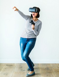 Woman enjoying virtual reality game