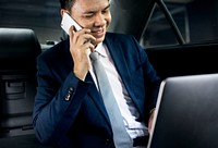 Businessman sitting in the car