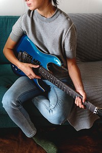 Woman playing guitar