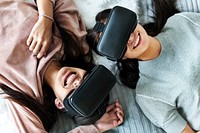 Women experiencing virtual reality with VR headset