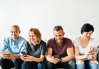 Diverse friends using phones isolated