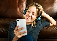 A woman listening to the music