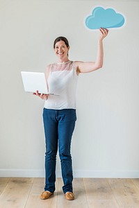 White woman using computer cloud network