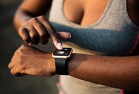 A woman wearing a smartwatch