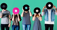 Group of young adults with vinyl disc