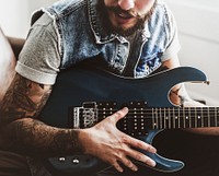 Rock guitarist in a studio
