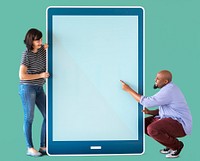 Diverse couple holding a tablet
