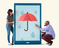 Diverse couple of people holding a tablet