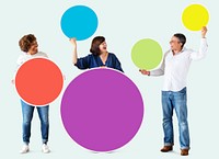 Diverse people holding colorful blank circles