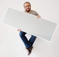 Man holding a blank banner