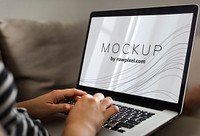 Woman using a laptop with a screen mockup