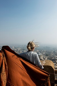 Western woman exploring Jaisalmer Fort, Rajasthan, India