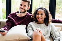 Couple watching a tv show together