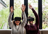 Young couple using VR together