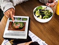Woman looking for healthy food online<br />