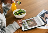 Woman looking for healthy food online<br />