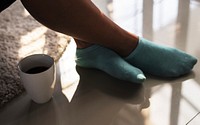 Woman having a warm cup of coffee