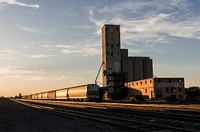 A grain elevator adjoins freight-rail tracks in Wichita Falls, Texas. Original image from Carol M. Highsmith&rsquo;s America, Library of Congress collection. Digitally enhanced by rawpixel.